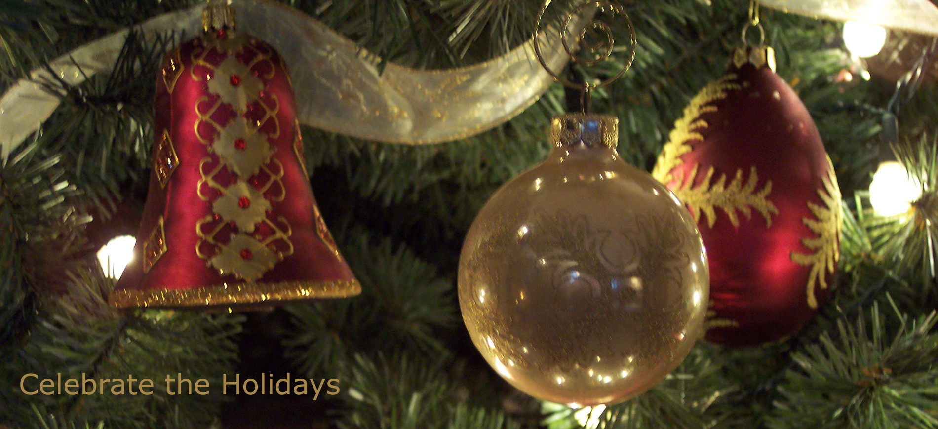 Celebrate the Holidays! Red & gold bell, gold ball, red & gold ball & gold ribbon on Christmas tree