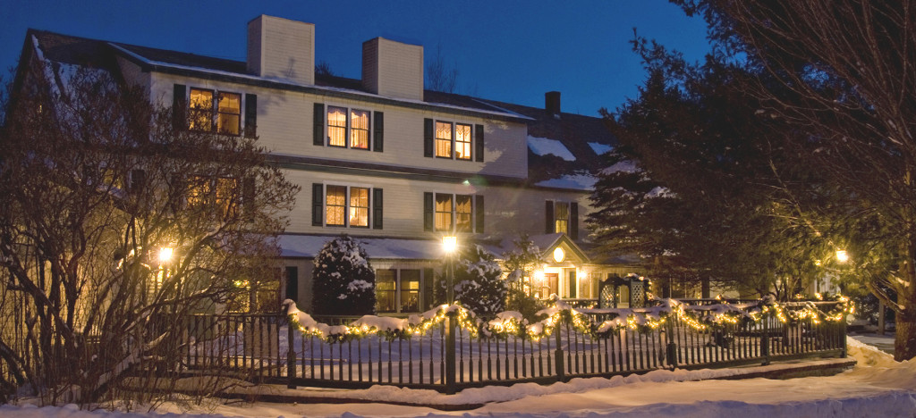 Picture of the home with snow.