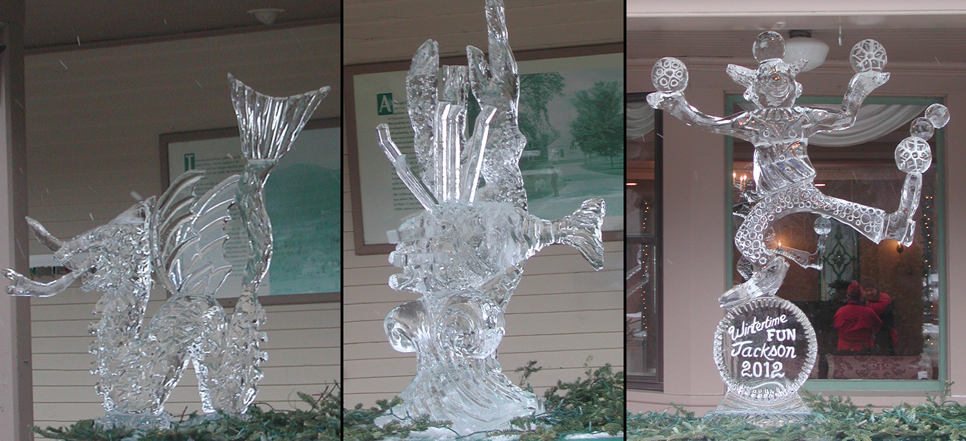Three ice sculptures on covered porch.
