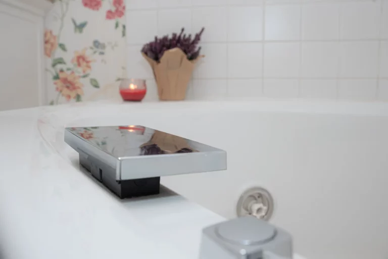 bathroom featuring deep bathtub.