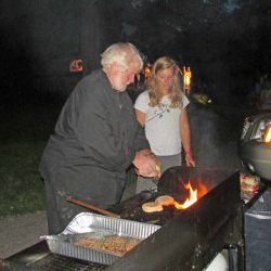 serving food at covered bridge dance